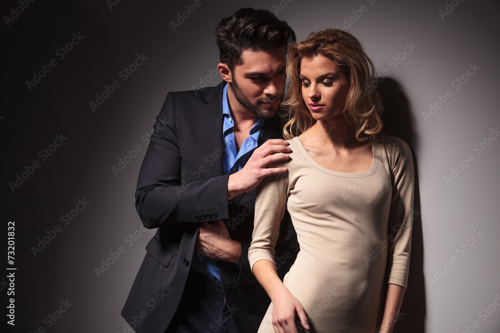 Handome young business man looking at his lover Handome young business man looking at his lover