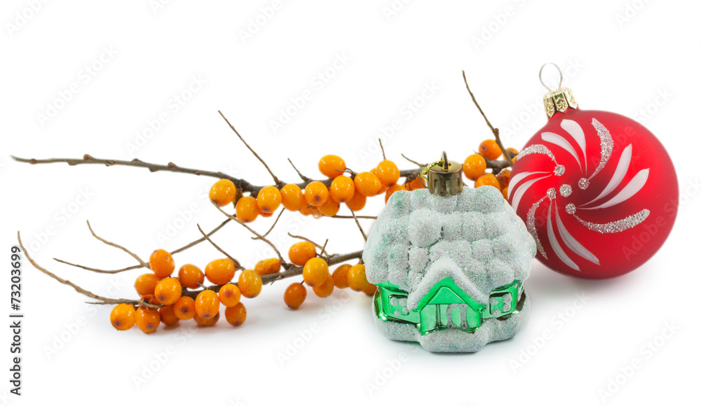 Christmas ornaments and branch of sea-buckthorn berries isolated Christmas ornaments and branch of sea-buckthorn berries isolated