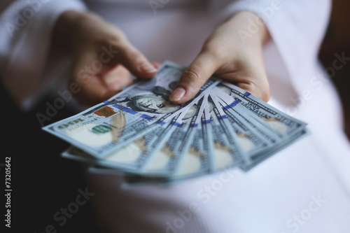 Woman hands holding money