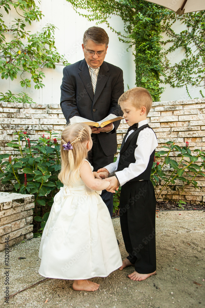 Boy and girl getting married Stock Photo Adobe Stock