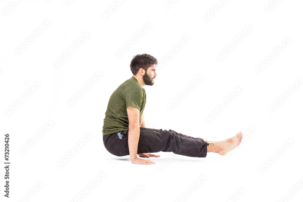 Man in crow pose