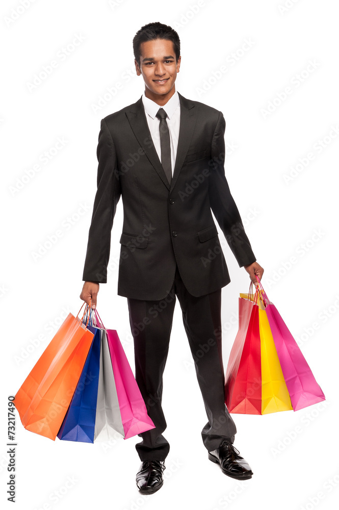 Young Mixed Race Man with Shopping Bags. Young Mixed Race Man with Shopping Bags.