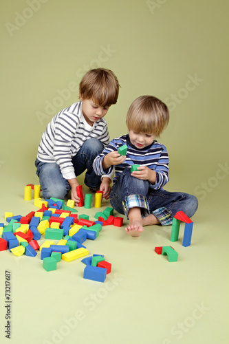 Obraz na plátne Kids, Children Sharing and Playing Together