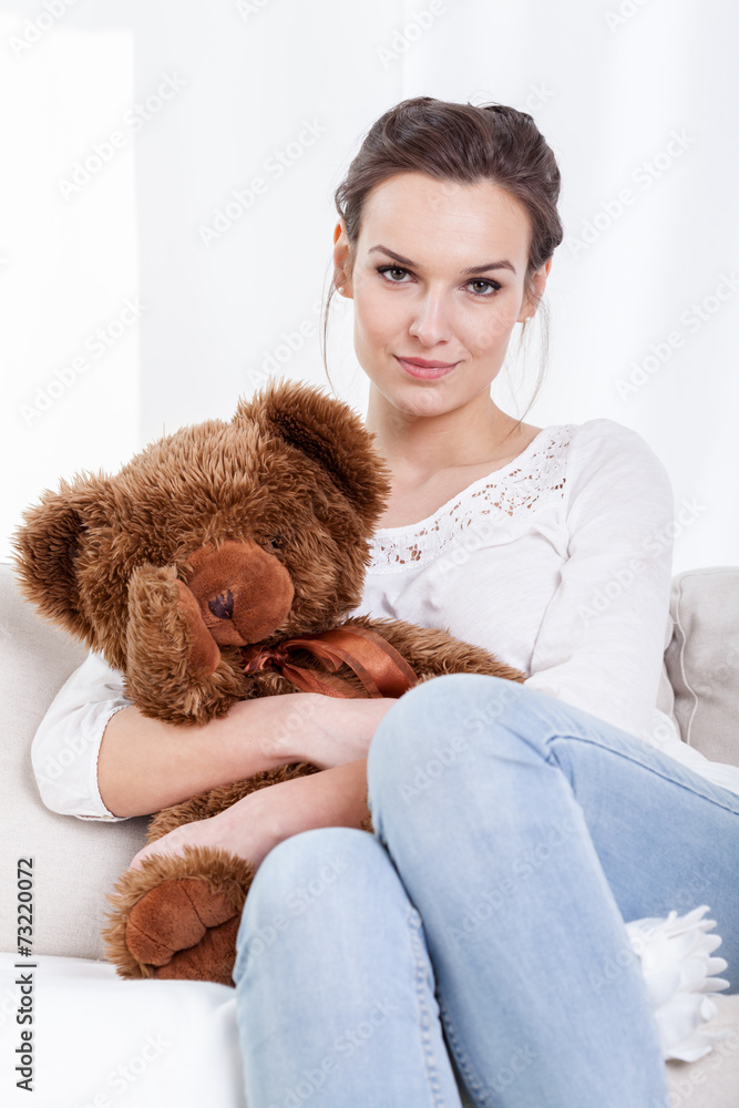 Mother sitting with teddy bear Mother sitting with teddy bear