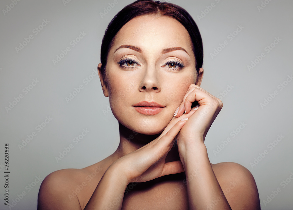 Beautiful Spa Woman Touching her Face Beautiful Spa Woman Touching her Face