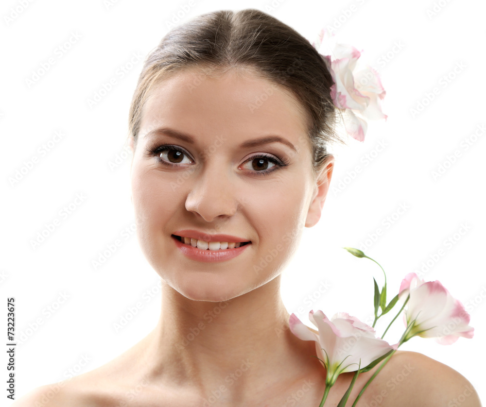 Beautiful young woman with flowers isolated on white