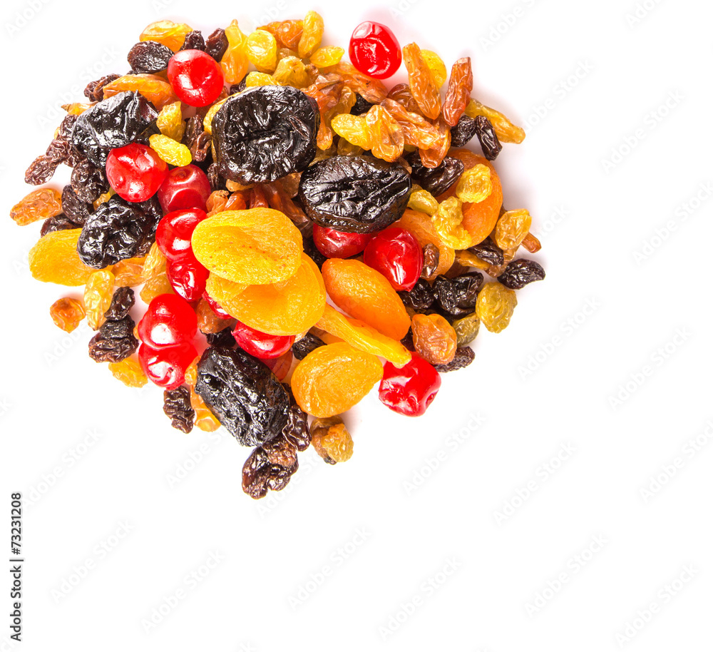 Mix variety of dried fruit over white background Mix variety of dried fruit over white background