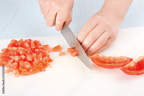 cutting tomatoes
