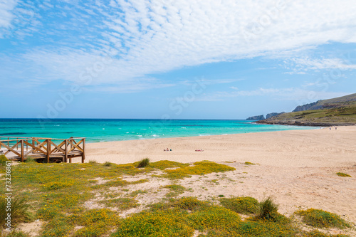 Sand beach turquoise sea bay view, Cala Mesquida, Majorca island