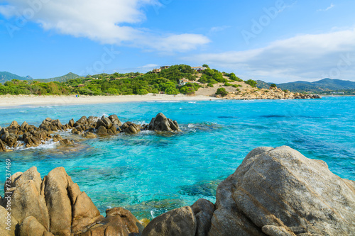 Rocks on Porto Giunco beach and turquoise sea water, Sardinia