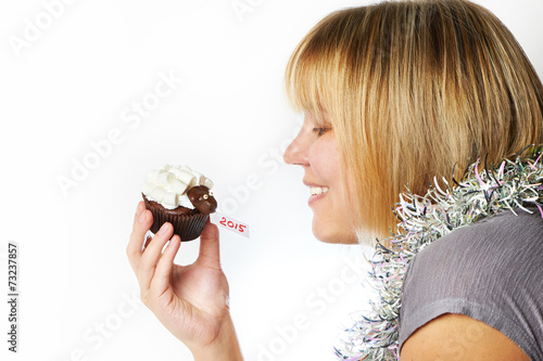 Young woman holds cake lamb as simbol 2015 new years isolated