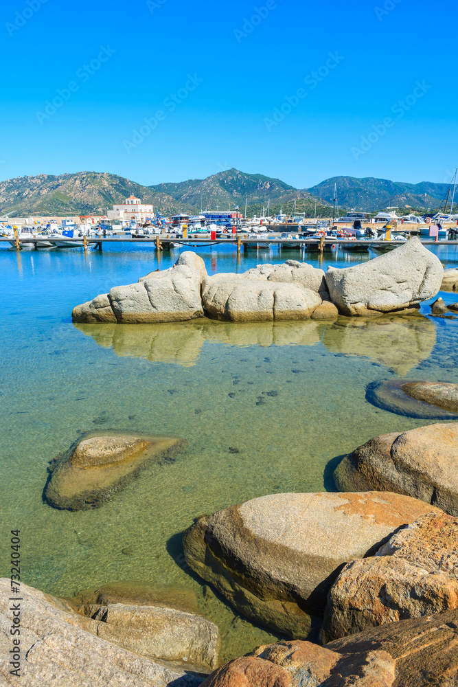 Rocks in water of Porto Giunco port, Sardinia island, Italy