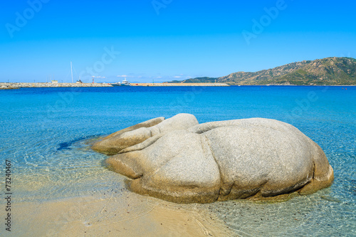 Fototapeta Naklejka Na Ścianę i Meble -  Stones in sea water on Spiaggia del Riso beach, Sardinia island