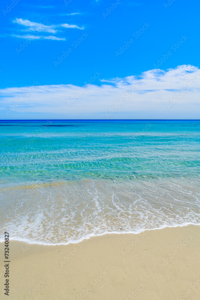 Turquoise sea water on coast of Porto Giunco bay, Sardinia Turquoise sea water on coast of Porto Giunco bay, Sardinia