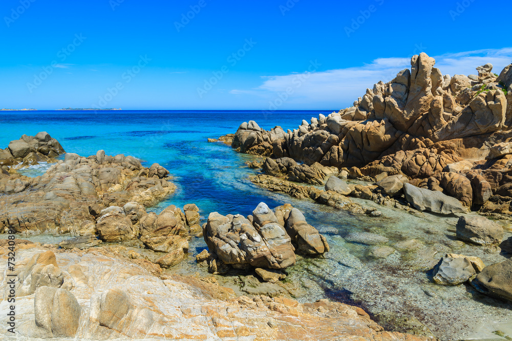 Rocks and azure sea water of Porto Giunco beach, Sardinia island