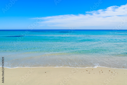 Turquoise sea water on coast of Porto Giunco bay, Sardinia