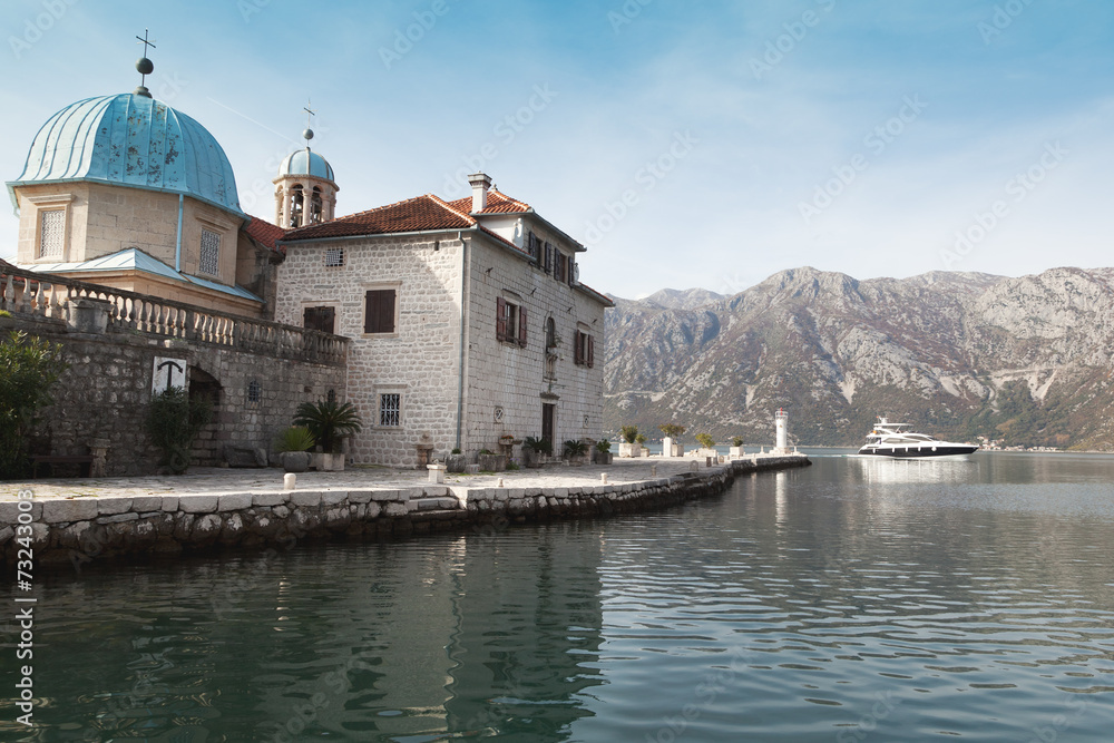 Our Lady of the Rock island and Church in Perast on shore of Bok