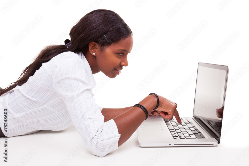 African American woman using a laptop - Black people African American woman using a laptop - Black people