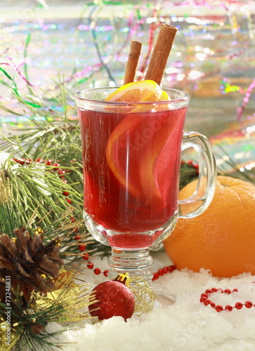 Glass of mulled wine with christmas decoration