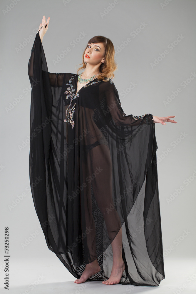 Portrait of the young sexy woman in black tunic Arabic