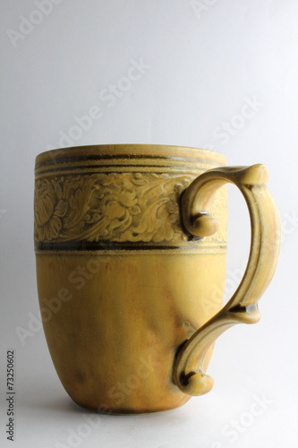 Yellow clay cup.