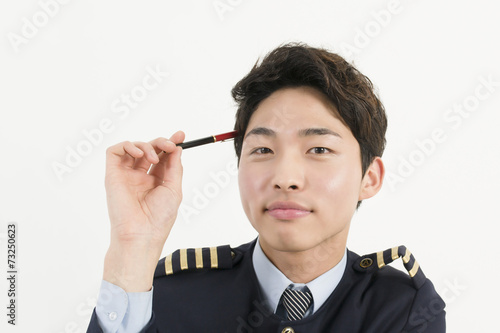 Airline pilot with pen