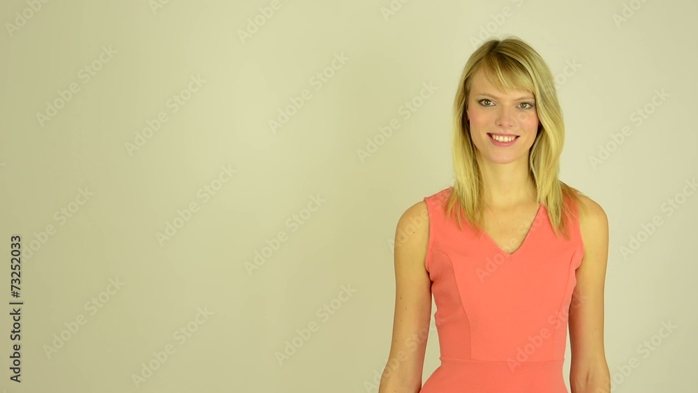 young attractive woman smiles - studio young attractive woman smiles - studio
