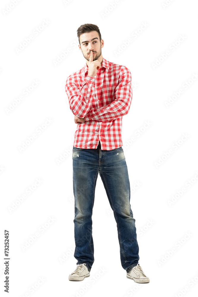 Man thinking with finger over his mouth Man thinking with finger over his mouth