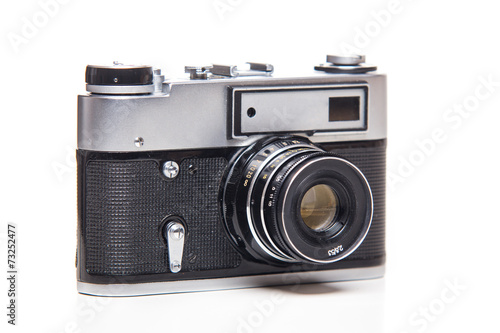 Classic 35mm old analog camera on white