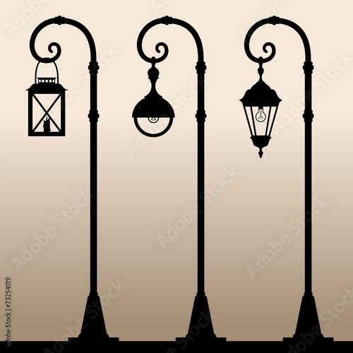 Black silhouettes of three different Lampposts.