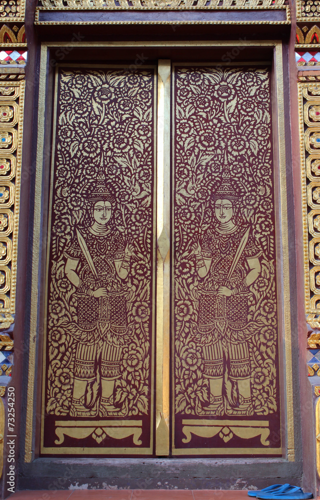 Thai temple gate in Wat Chiang Mun, Chiangmai, Thailand.