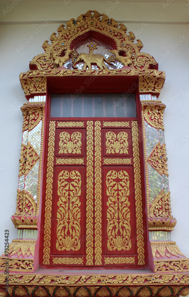 Thai temple window at Wat Lamchang, Chiangmai, Thailand.