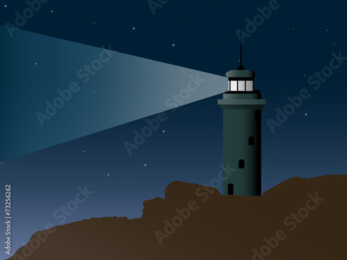 Lit Lighthouse on a Very Rocky Shore