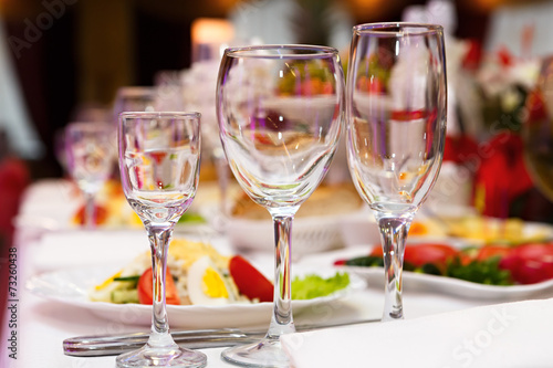 Glasses for drinks and cocktails at the festive table