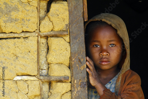 Madagascar-shy and poor african girl with headkerchief