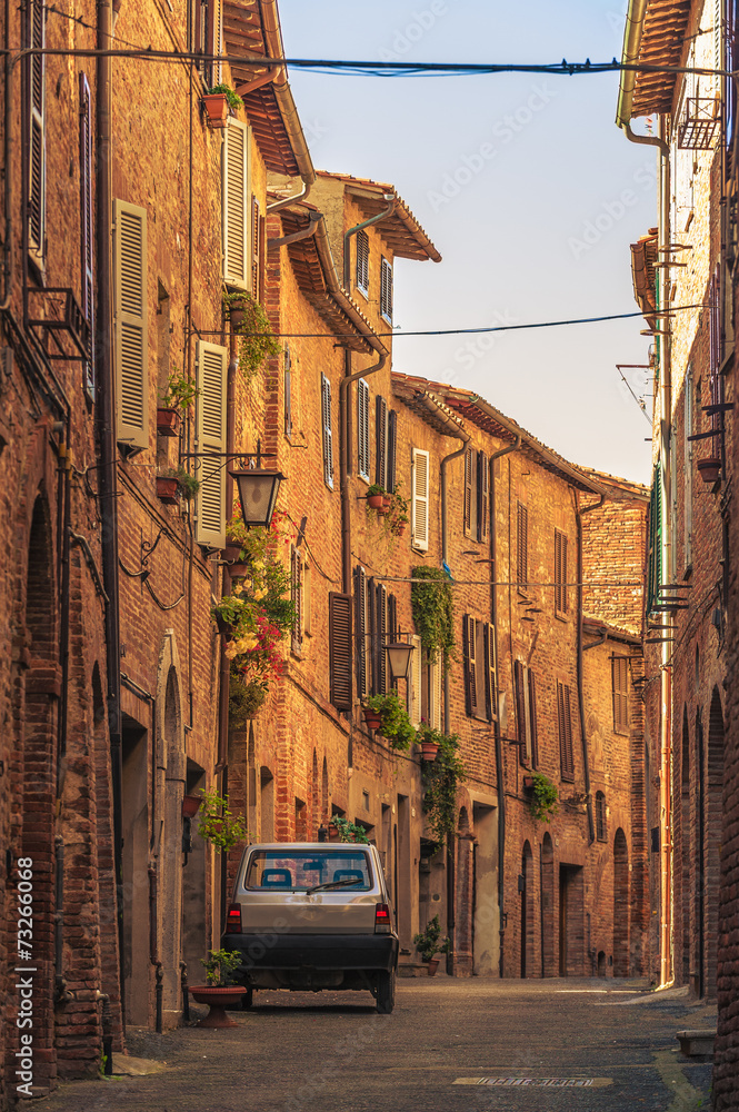 Small car on the streets in the Italian town in Tuscany