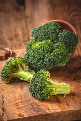 Green delicious broccoli on a wooden rustic table