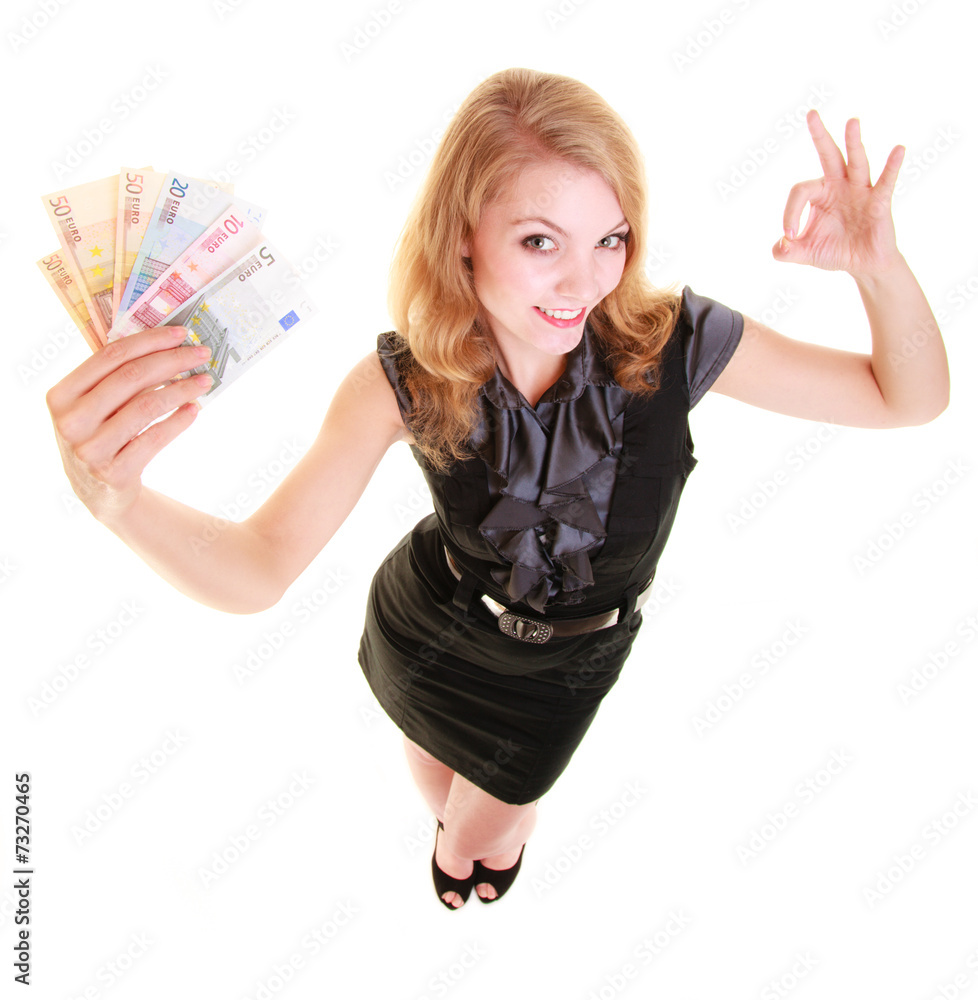 Obraz premium Economy finance. Woman holds euro currency money.