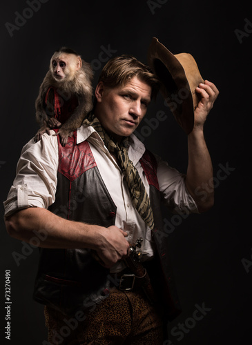 Fotografía Mature man adventurer with his monkey companion