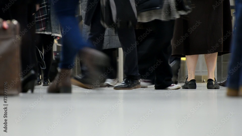 business commuters and travelers moving at a busy public space business commuters and travelers moving at a busy public space