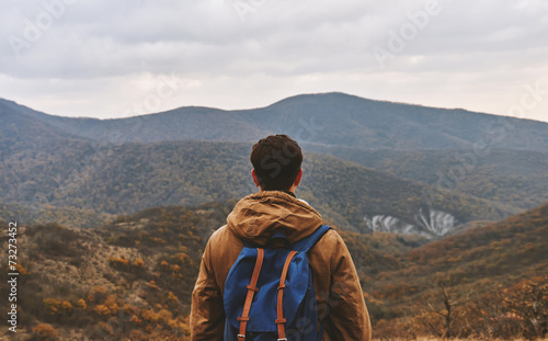 Man looking on mountains  rear view