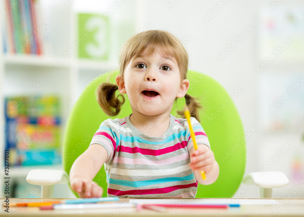 emotional child girl drawing with colourful pencils emotional child girl drawing with colourful pencils