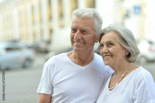 Mature couple walking in town