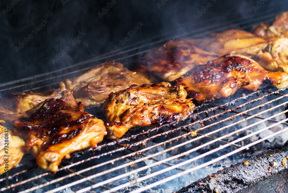 Chicken grilled on white dish . Chicken grilled on white dish .