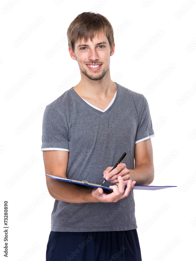 Man write on clipboard