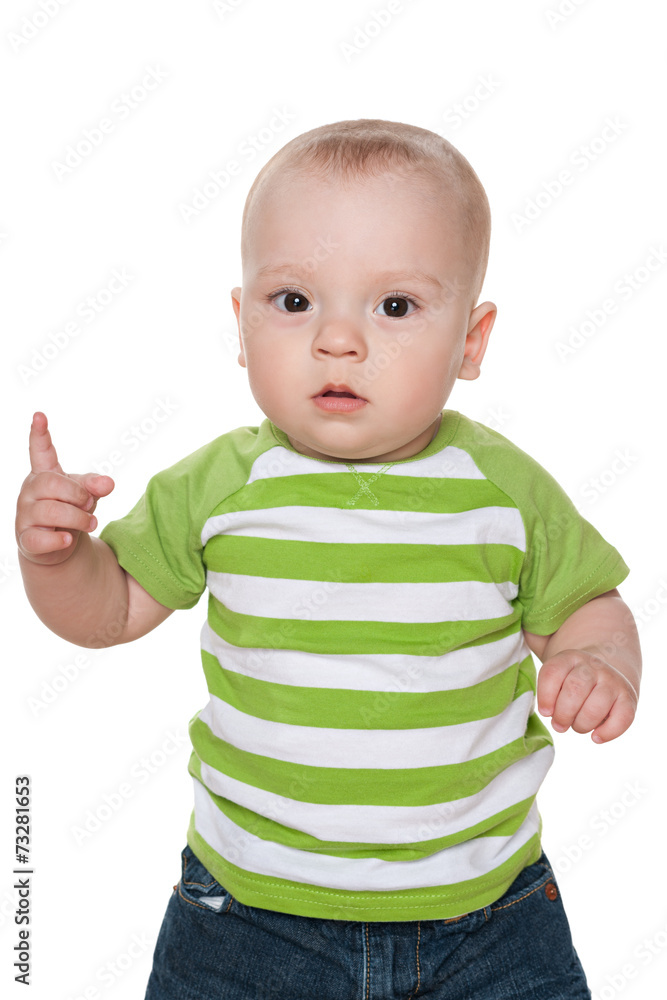 Serious baby boy shows his finger up