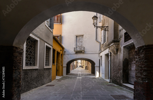 Arched  street in the town of Chioggia  Italy