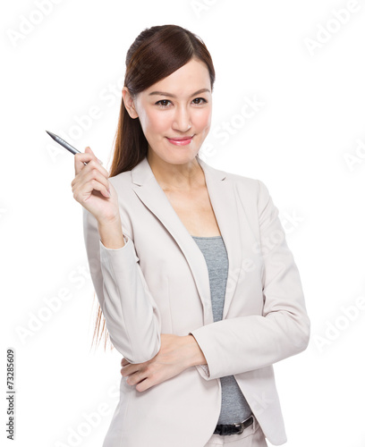 Businesswoman with pen up