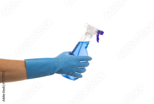 Hand holding blue plastic bottle