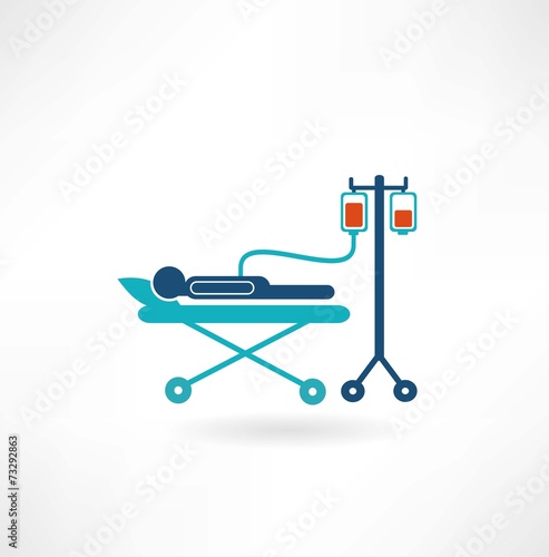 donor lies on a gurney and blood transfusions icon